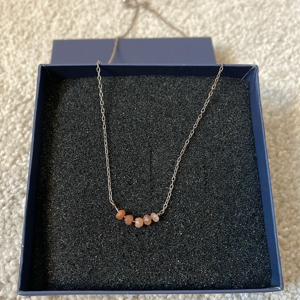 Gold jeweled necklace